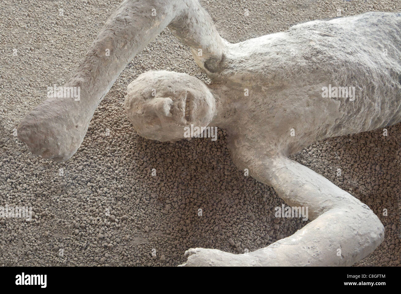 Man's body plaster cast inside Macellum, Pompeii, UNESCO World Heritage Site, Campania, Italy Stock Photo
