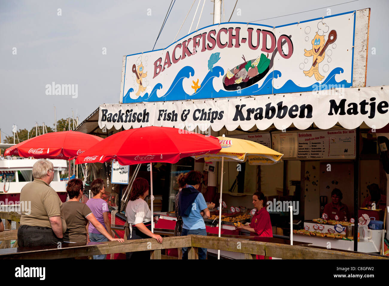 food stall with fish + chips and fish snacks in Warnemuende on the Baltic Sea, Rostock, Mecklenburg-Western Pomerania, Germany, Stock Photo