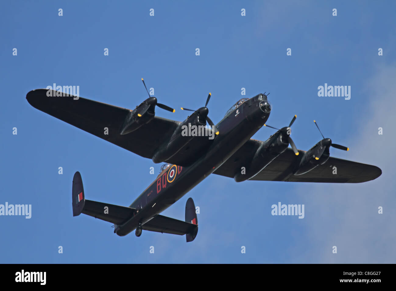 a restored WW2 lancaster bomber flying low Stock Photo