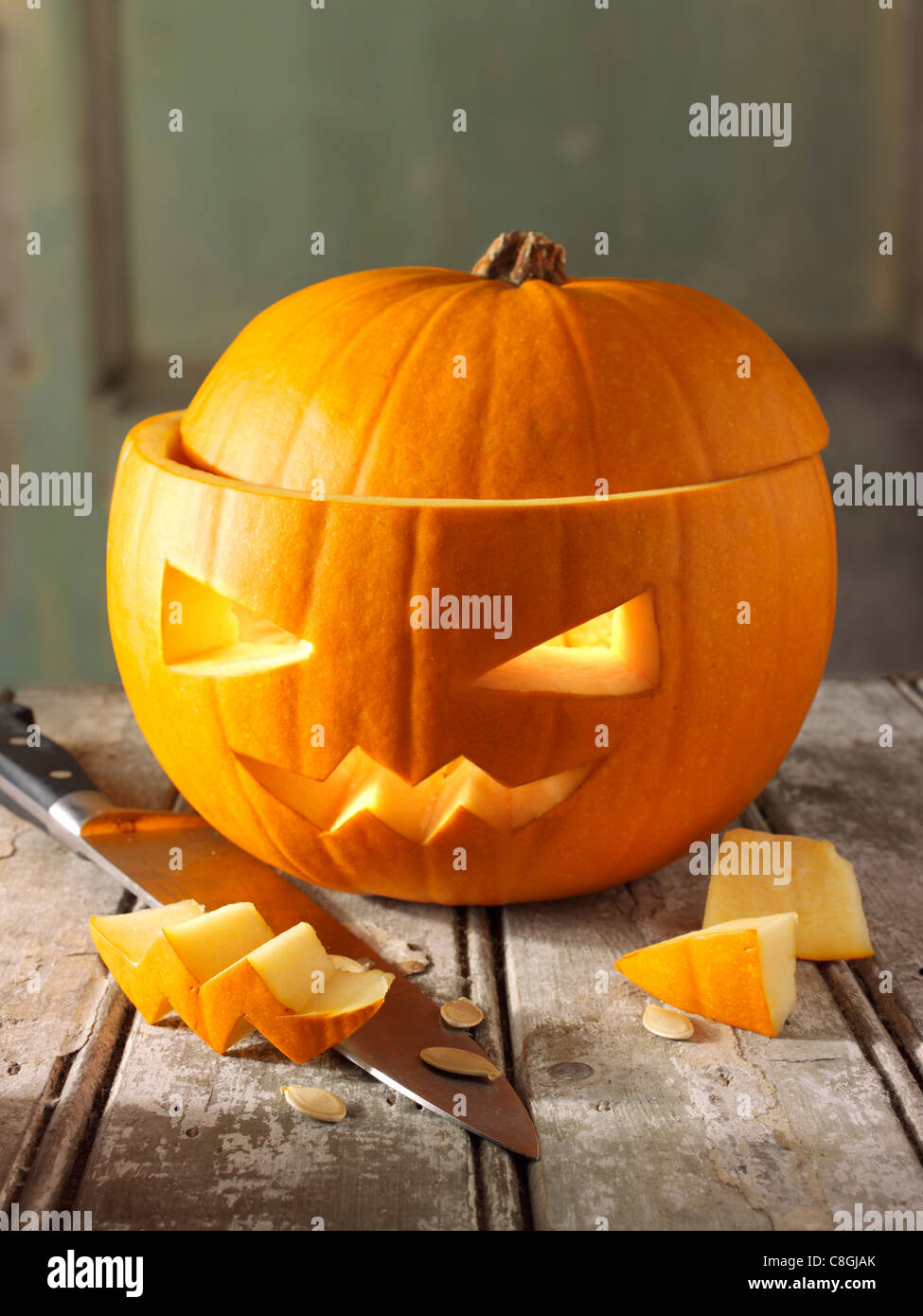 Pumpkin with a traditional Haloween carved face Stock Photo