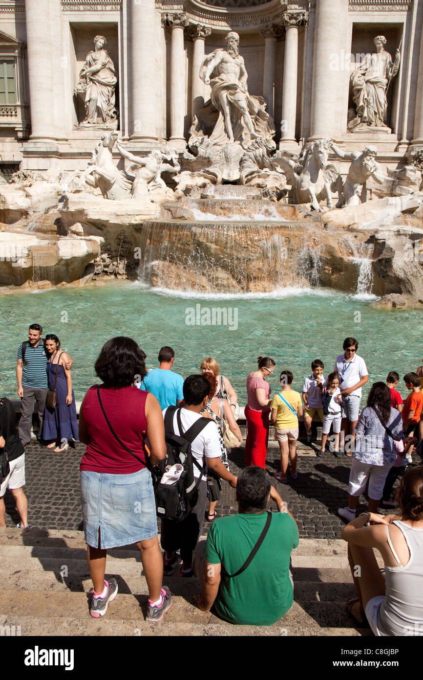 Tourists at the Trevi Fountain.A fountain in the Trevi rione in Rome, Italy. Stock Photo
