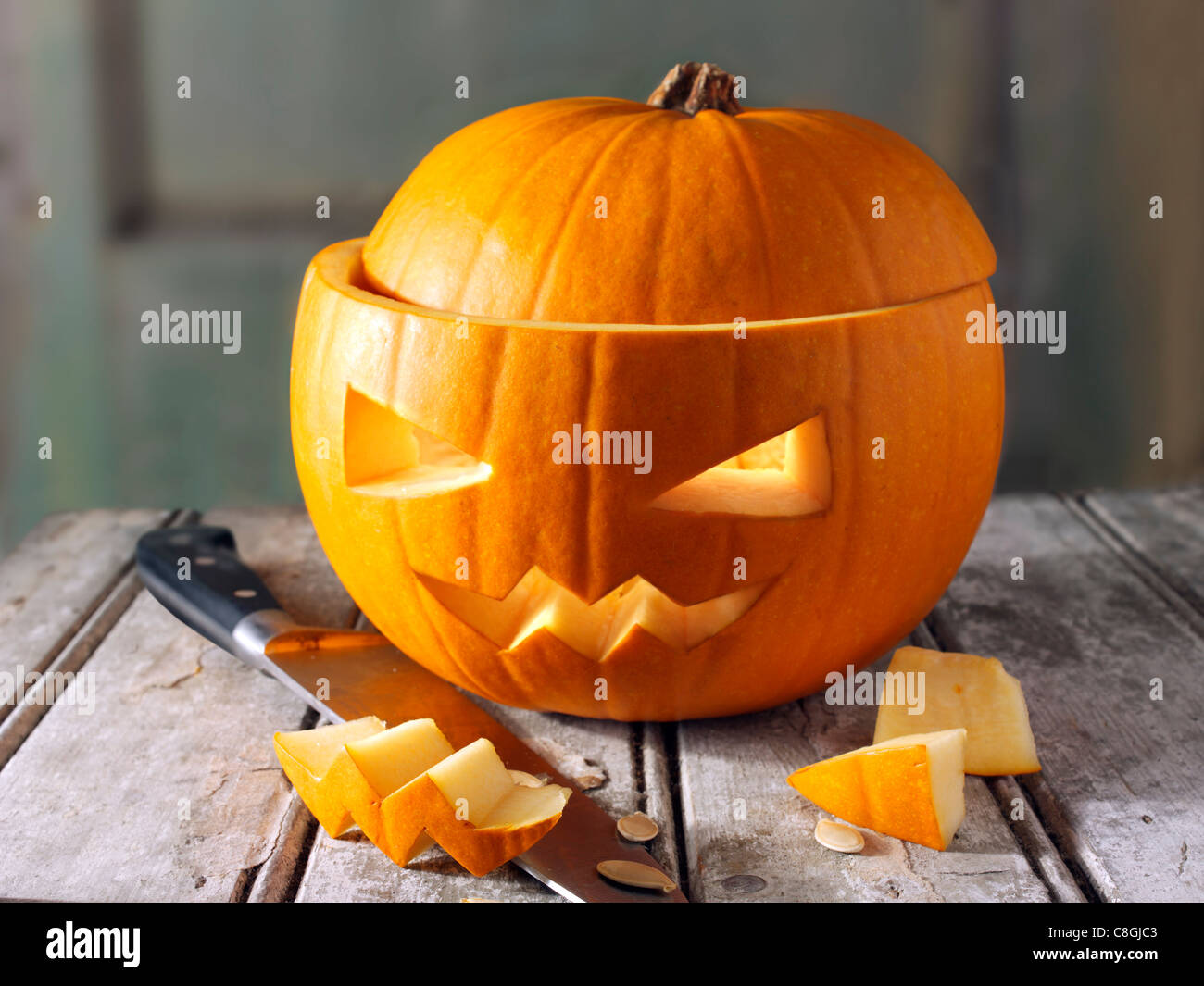 Pumpkin with a traditional Haloween carved face Stock Photo