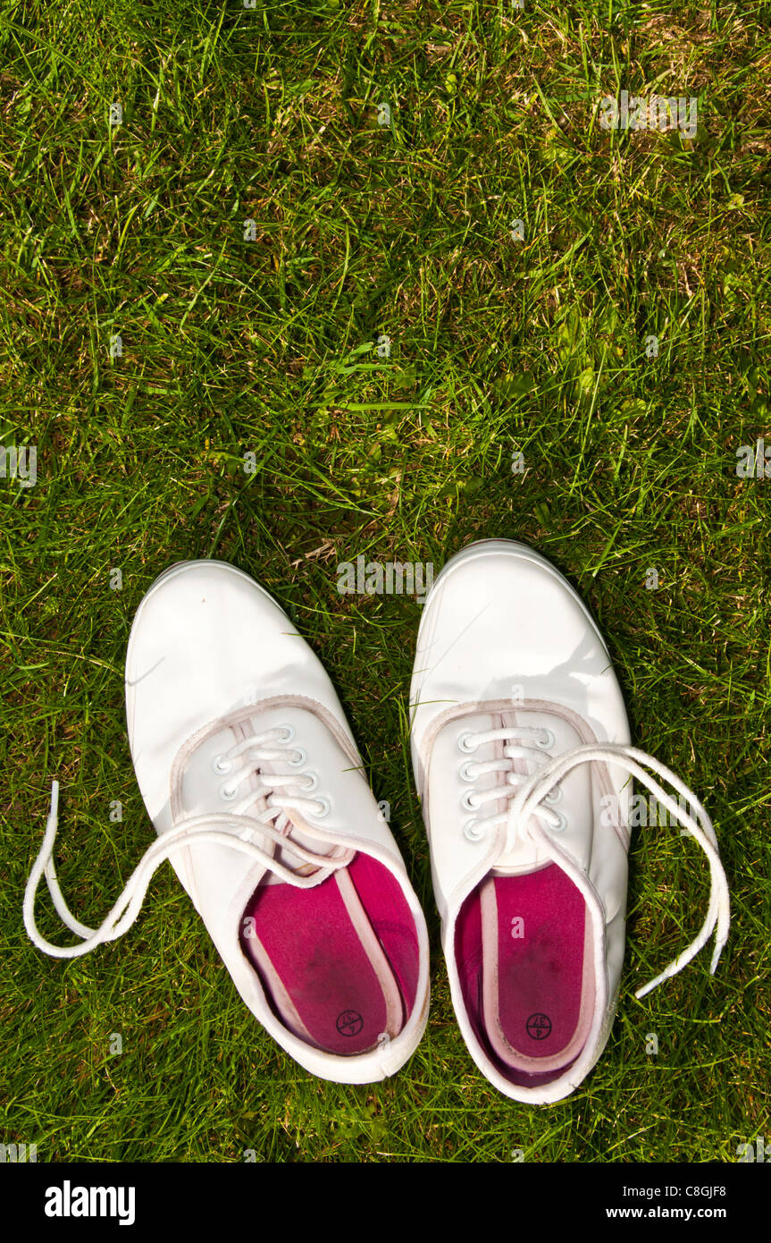 White summer shoes on grass Stock Photo Alamy