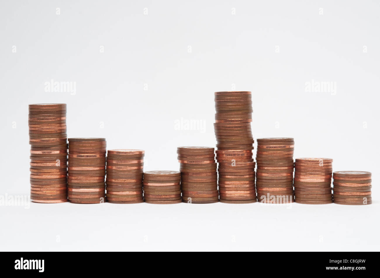 Piles of  one pence coins Stock Photo