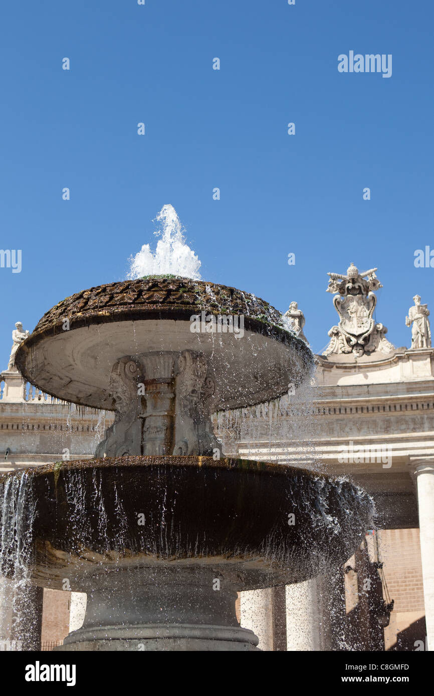 Fountains decorating Saint Peter's square Vatican city Rome Italy Stock Photo