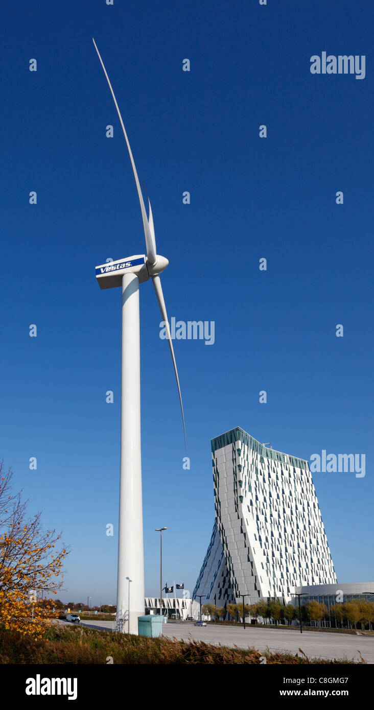 The large Vestas wind turbine and the spectacular Bella Sky Comwell Hotel at the Bella Center in Ørestaden, Copenhagen, Denmark Stock Photo