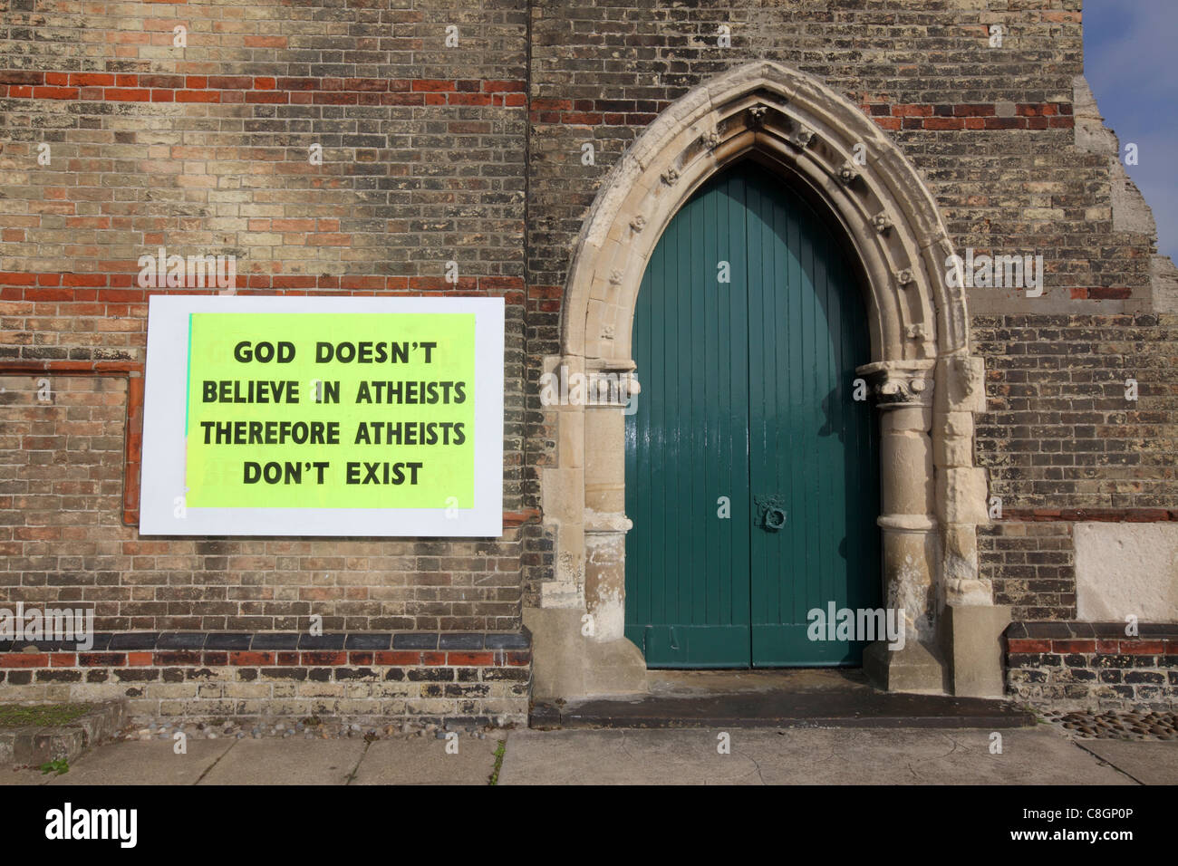'God Doesn't Believe in Atheists Therefore Atheists Don't Exist' sign outside of Christ Church, Lowestoft, UK. Stock Photo