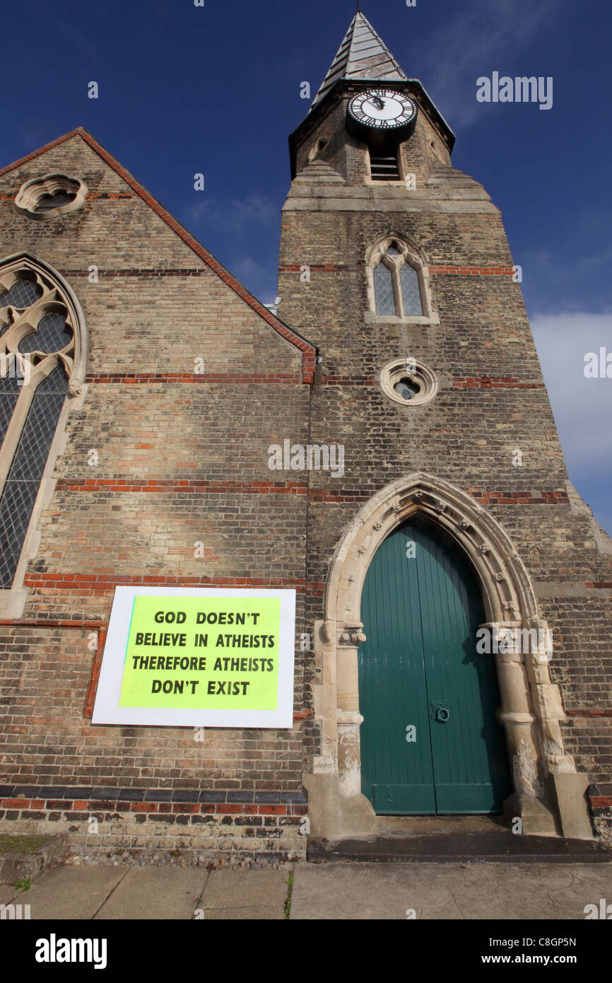 'God Doesn't Believe in Atheists Therefore Atheists Don't Exist' sign outside of Christ Church, Lowestoft, UK. Stock Photo