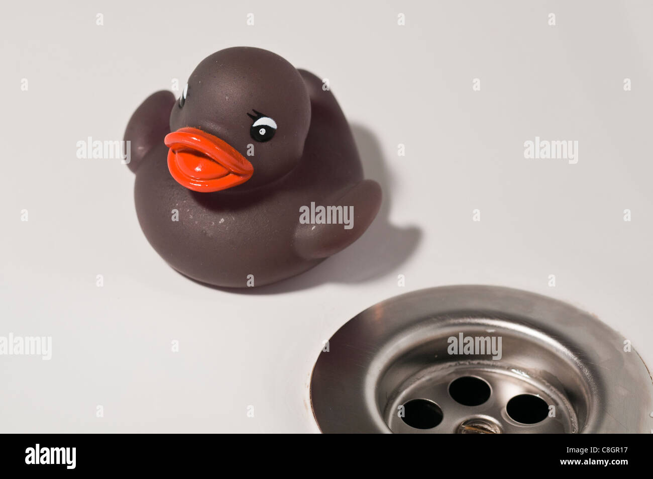 Rubber duck & plug hole Stock Photo Alamy
