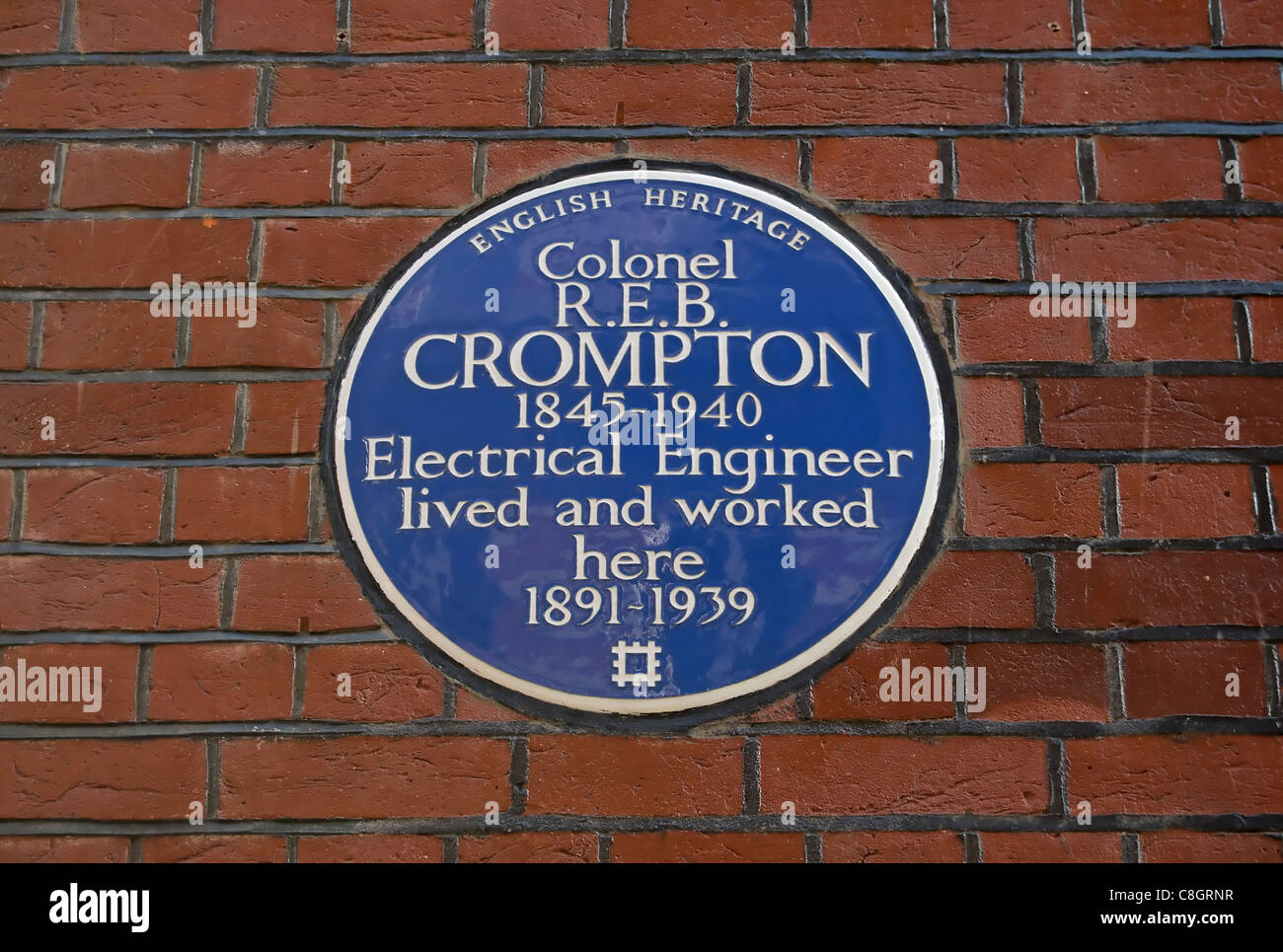 english heritage blue plaque marking a home of electrical engineer colonel r.e.b. crompton, kensington, london, england Stock Photo