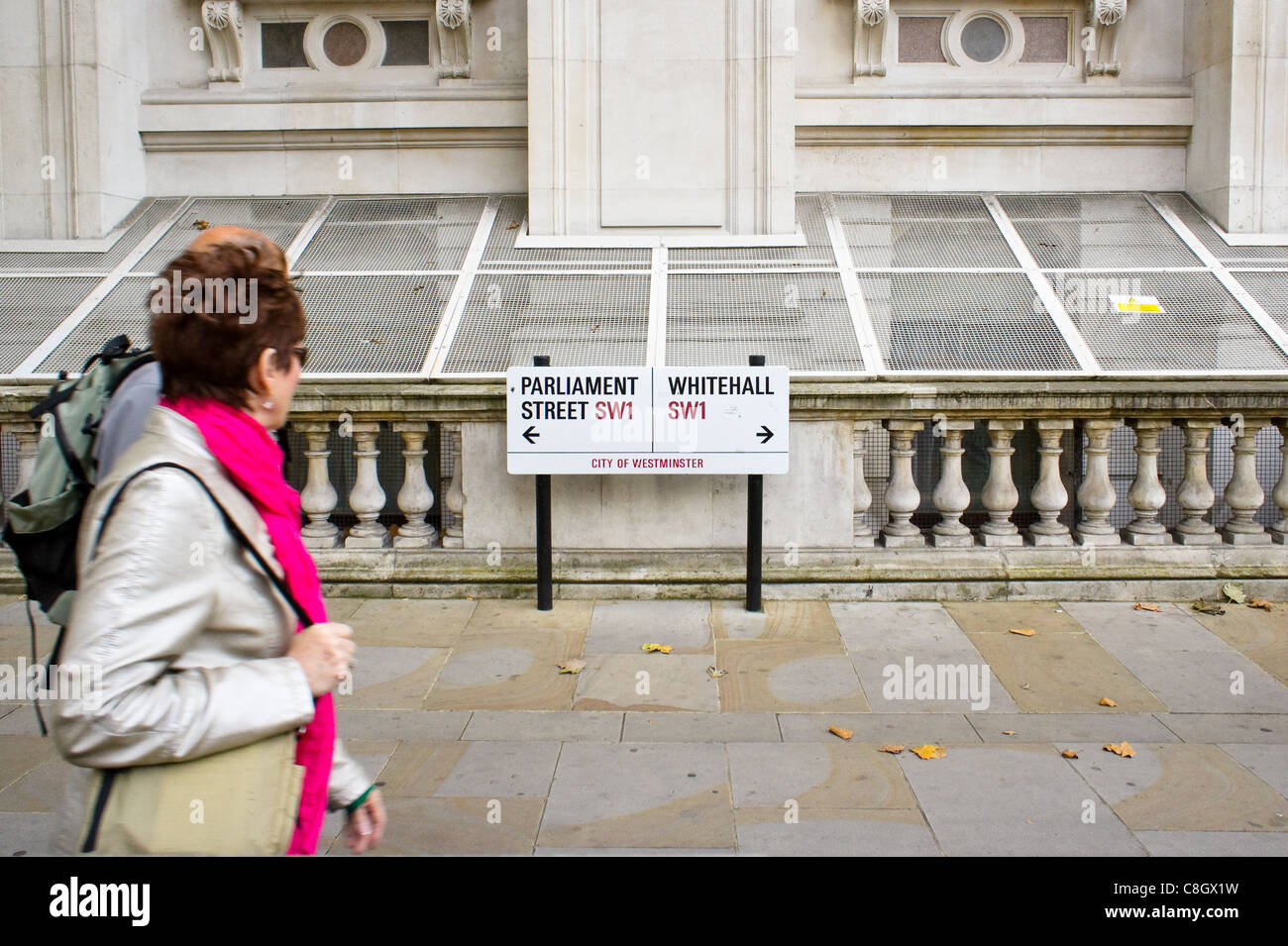 Whitehall-Parliament Street sign with pedestrians, London 2011 Stock Photo