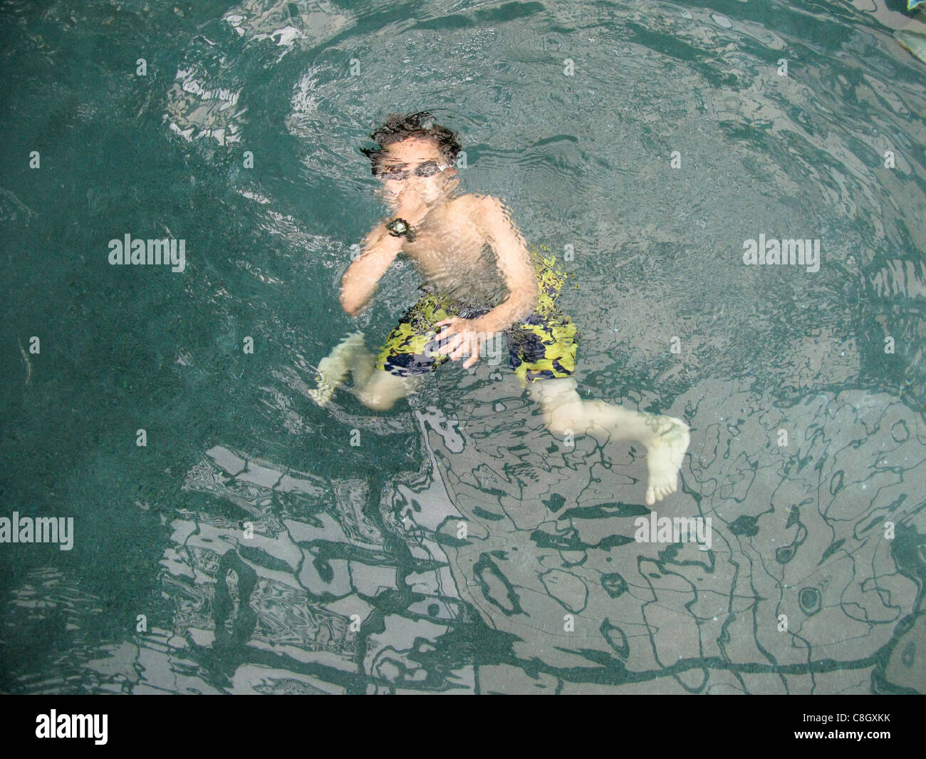 A young boy swimming underwater Stock Photo Alamy