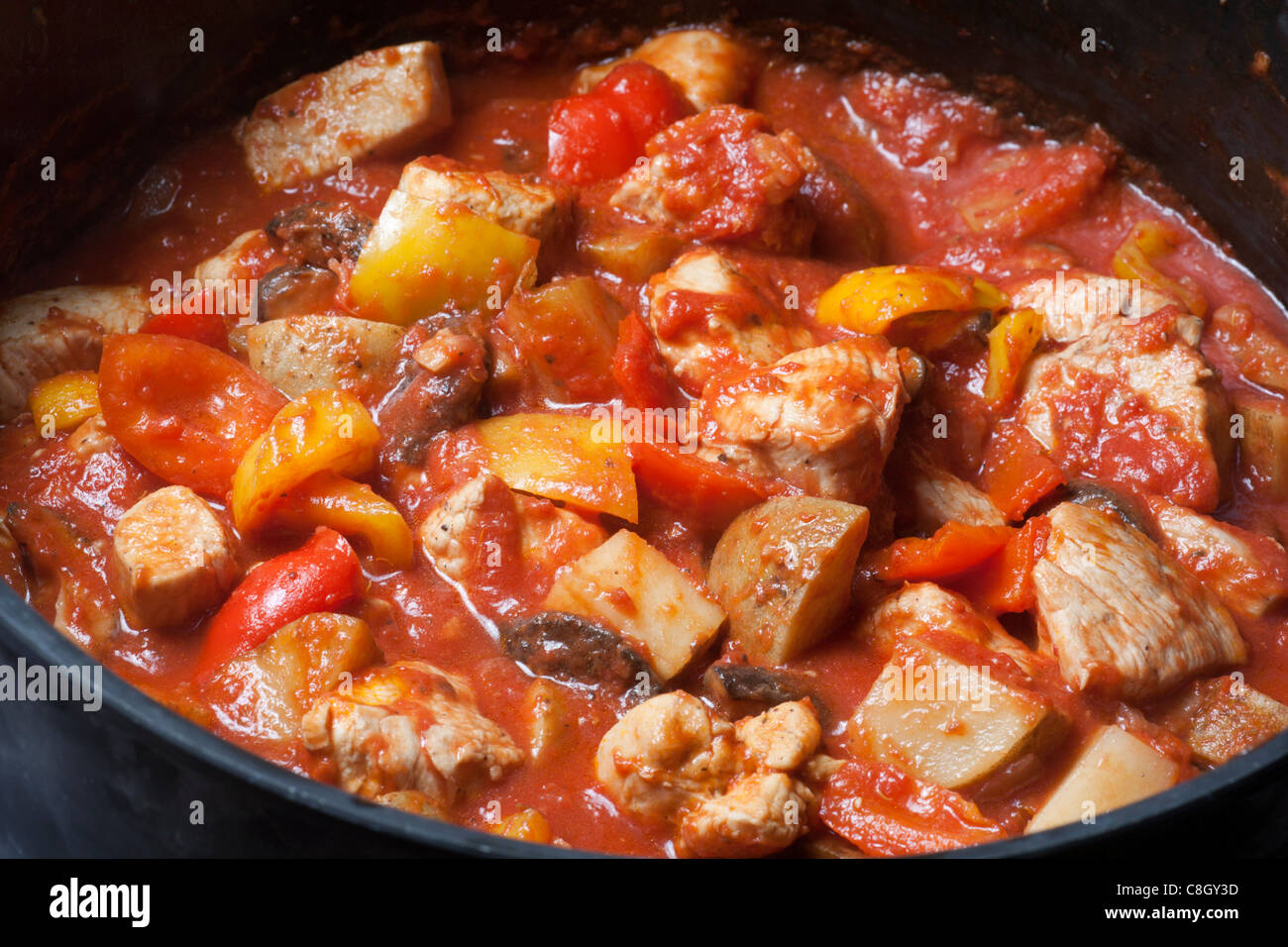 Chicken Murphy, classic American stew of chicken, potatoes, and peppers Stock Photo