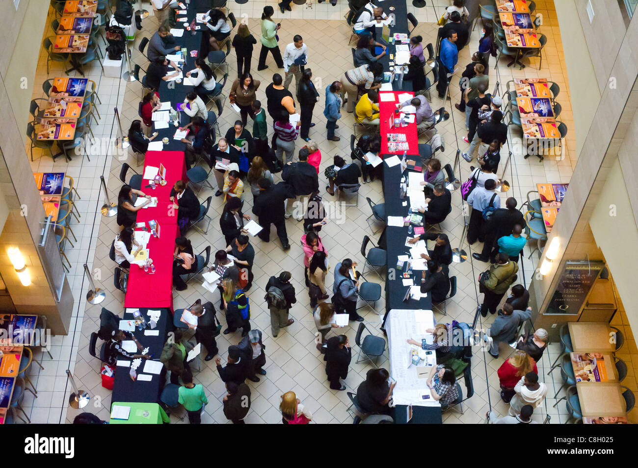 Job seekers attend a job fair in the borough of Queens in New York