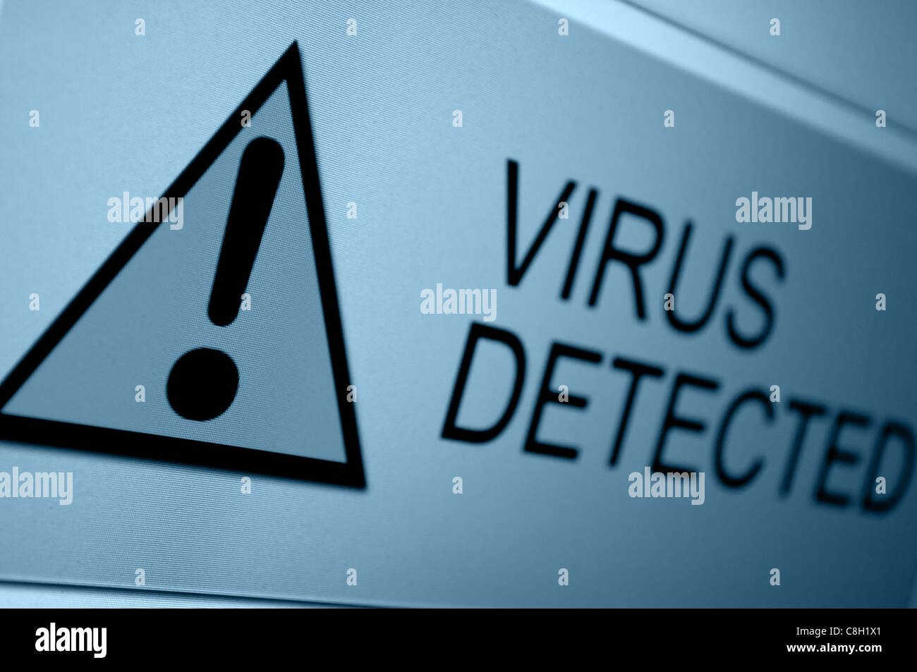 Closeup of Virus Detected Sign on LCD Screen Stock Photo