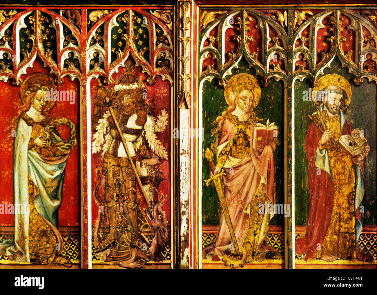 Filby, Norfolk, rood screen, St. Cecilia, George, Catherine of Alexandria, Peter male female saint saints English medieval Stock Photo