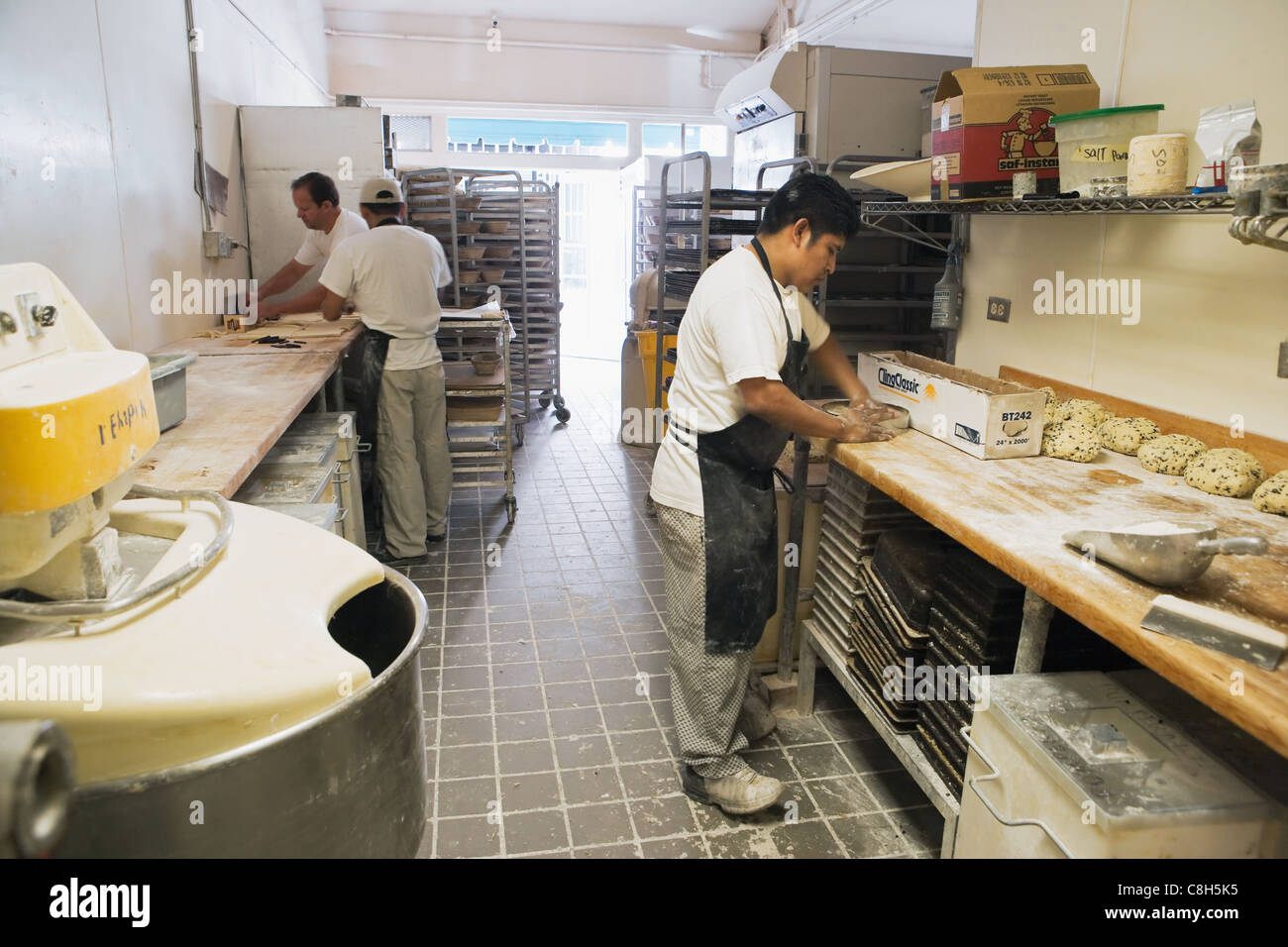 baker making scones, D'Angelo Pastry and Bread, Santa Barbara, California, United States of America Stock Photo