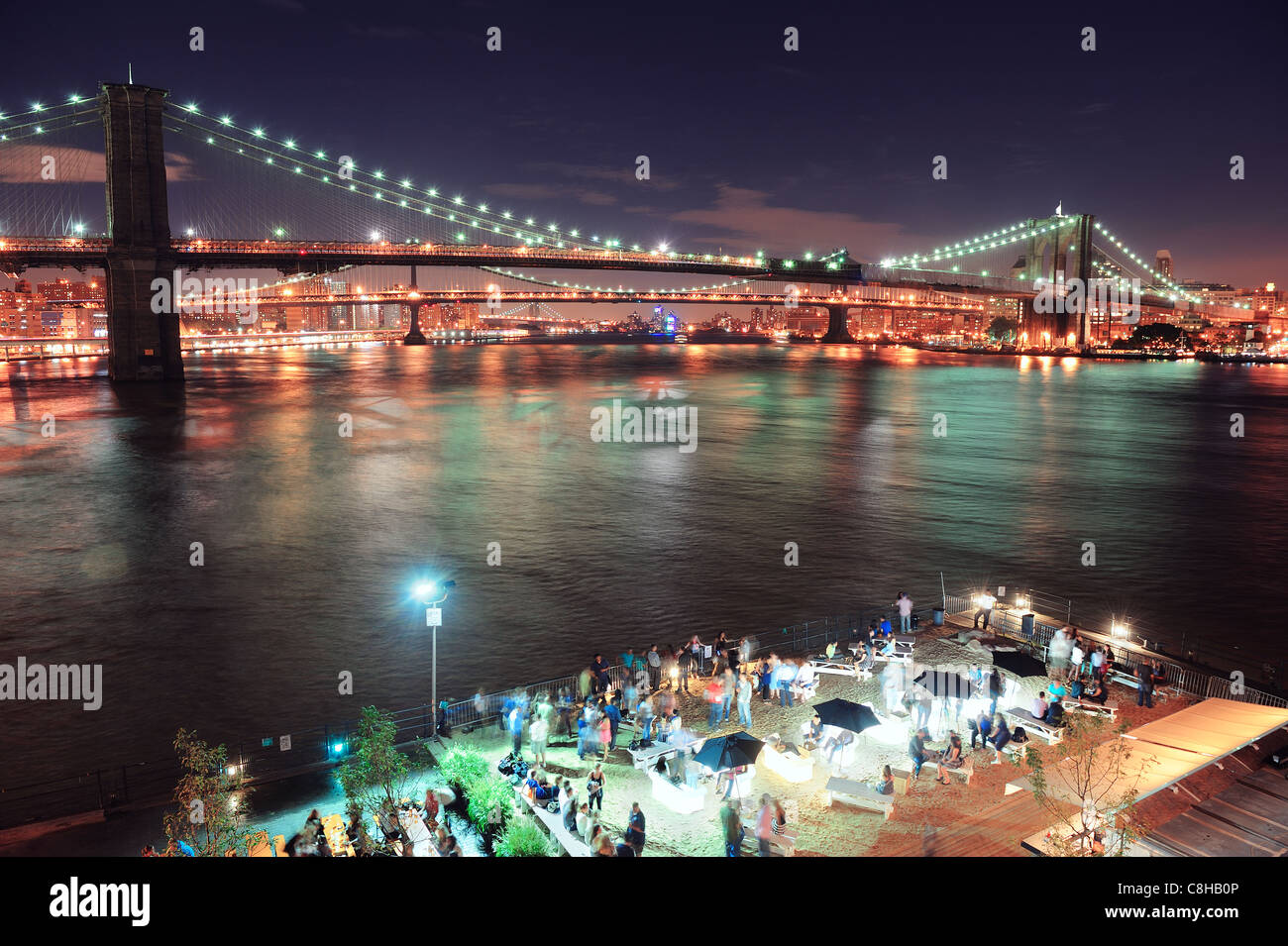 Brooklyn Bridge over East River at night in New York City Manhattan ...