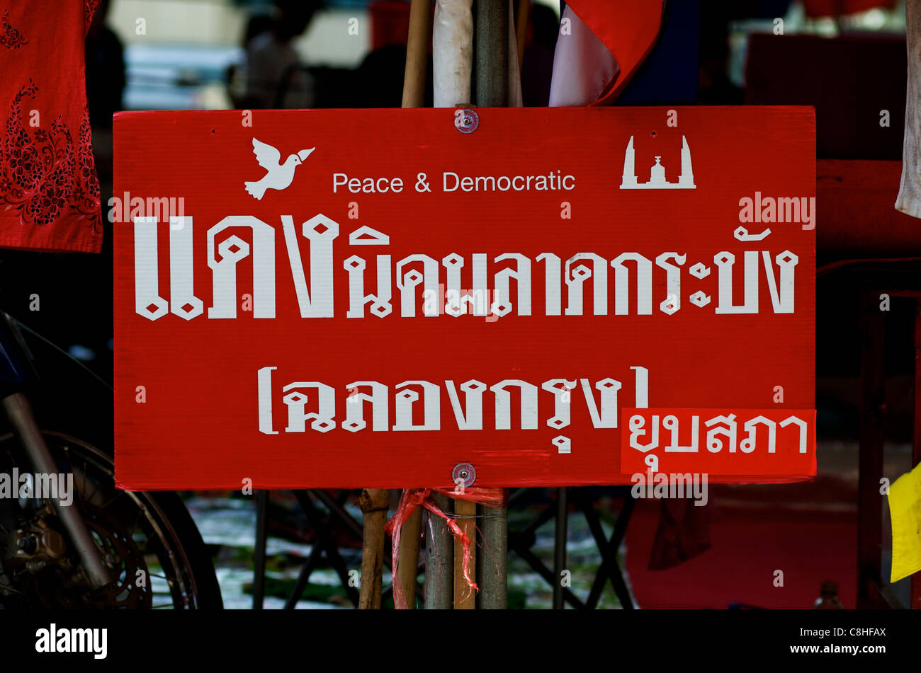 Bilingual Democracy sign in Thai & English, Red shirt protest, Ratchaprasong intersection, Rama 1 Road, Bangkok, Thailand. credit: Kraig Lieb Stock Photo