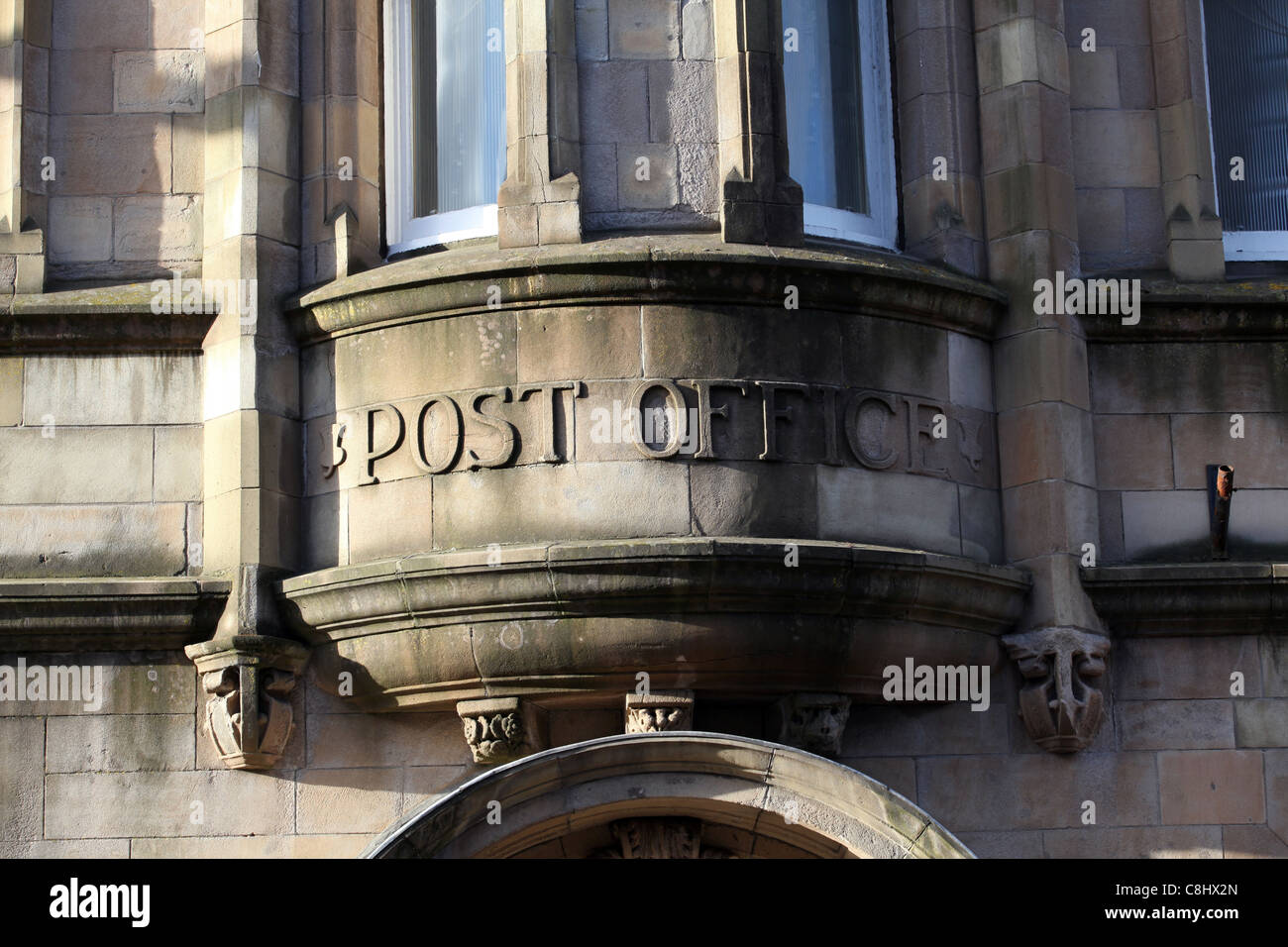 Old post office sign in stone in the town of Crieff in Perthshire, Scotland, UK Stock Photo