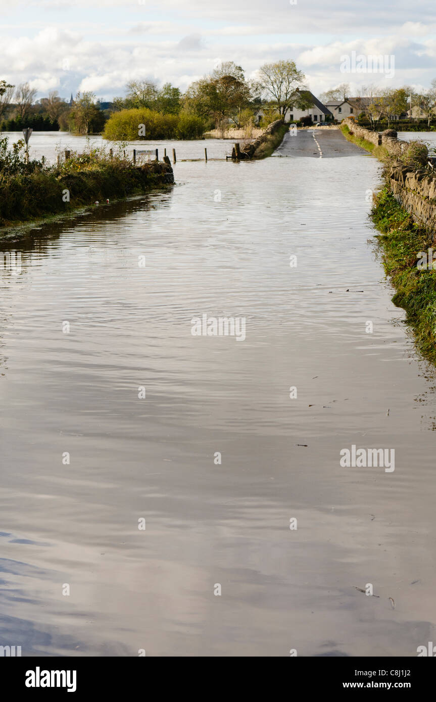 Flooded rural road Stock Photo