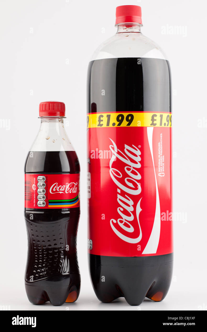 Two plastic bottles of Coca Cola one large one small Stock Photo
