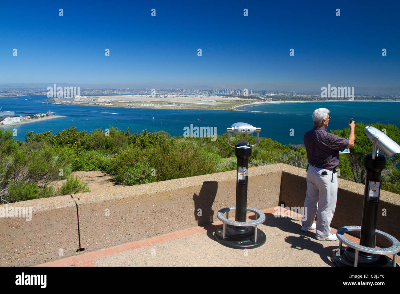 Tourists at a scenic overlook of San Diego and Coronado Island from Point Loma, California, USA. Stock Photo