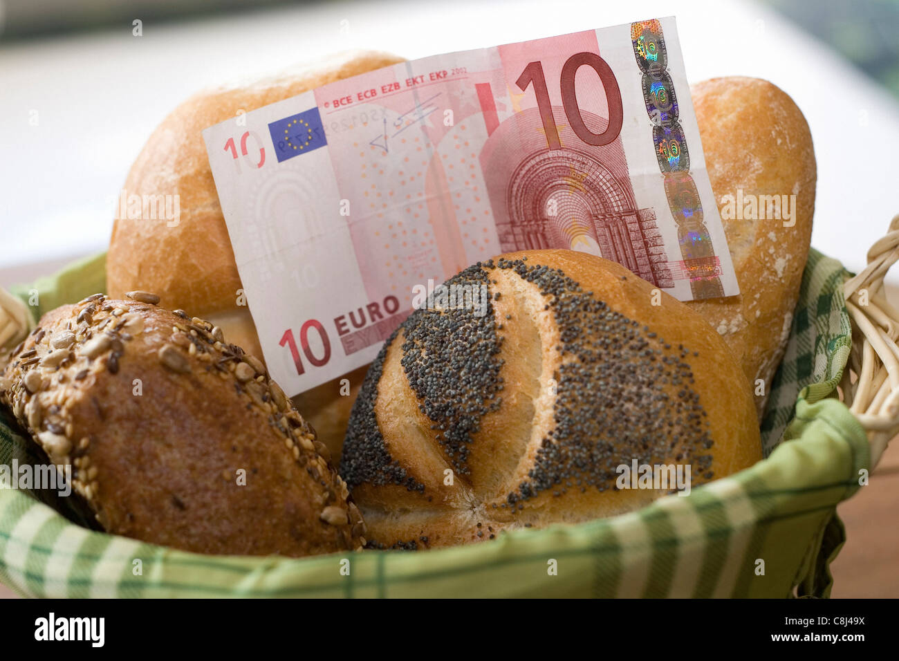 Food, bread rolls, bun, Waking up, Buns, money, bank note, bill, pay, pay, costs, expenses, price, price increase, mark up, infl Stock Photo