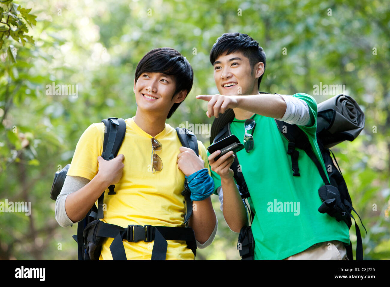 Hikers Using Mobile Phone With GPS Stock Photo Alamy