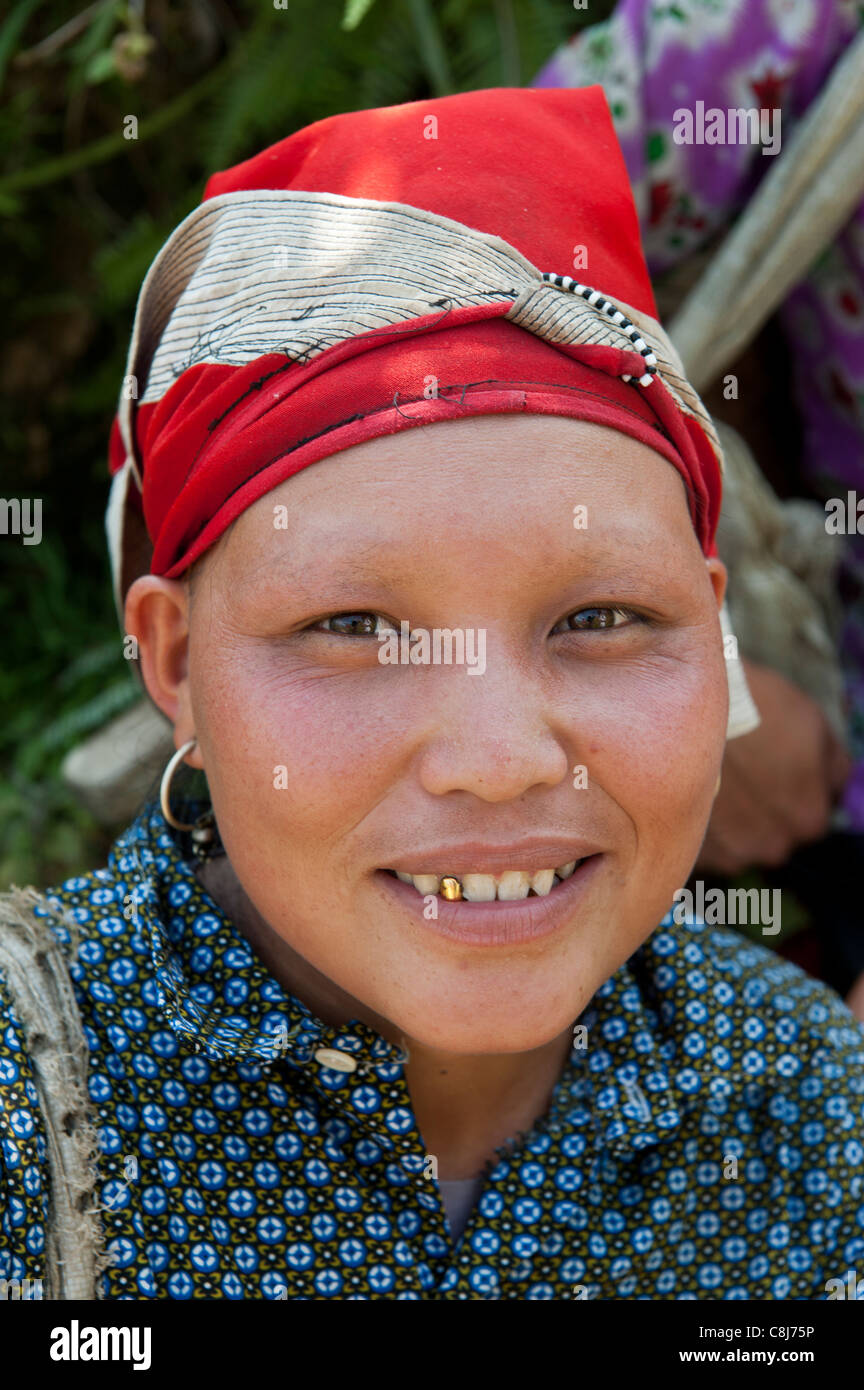 Red Dao woman with traditional shaved eyebrows. North Vietnam Stock Photo