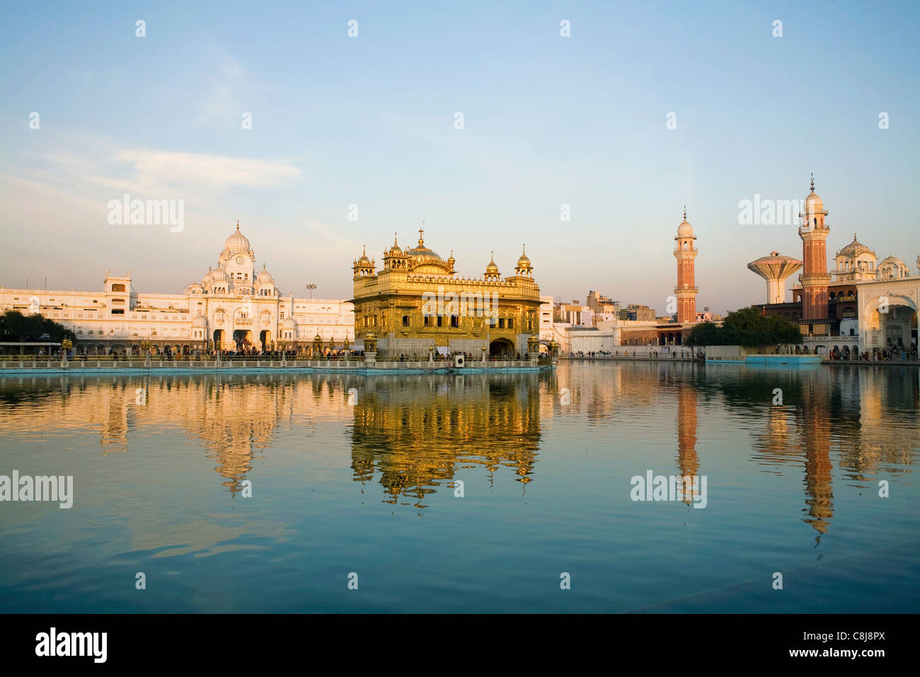The last rays the setting sun touch the Sikh Golden Temple in its