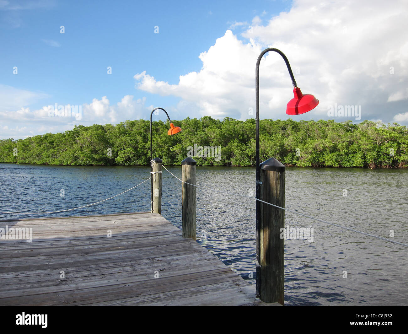 old wooden boat dock in Naples Florida Stock Photo