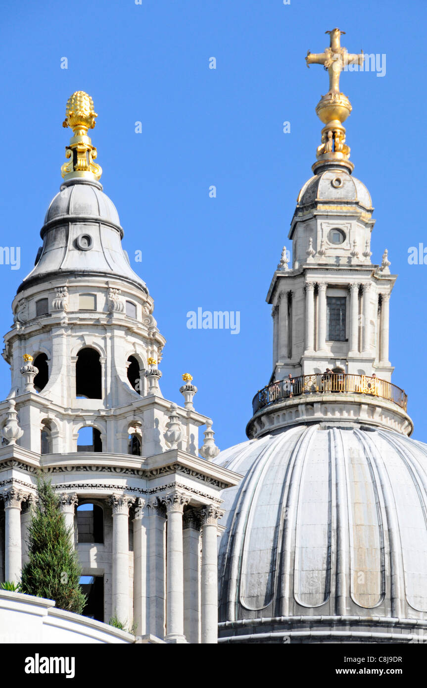 Tourists on observation & viewing platform above the dome of St Pauls Cathedral on a blue sky sunny day City of London England UK Stock Photo