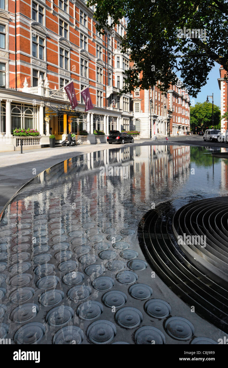Close up glass lenses & water feature surface reflections 'Silence’ created by Tadao Ando at