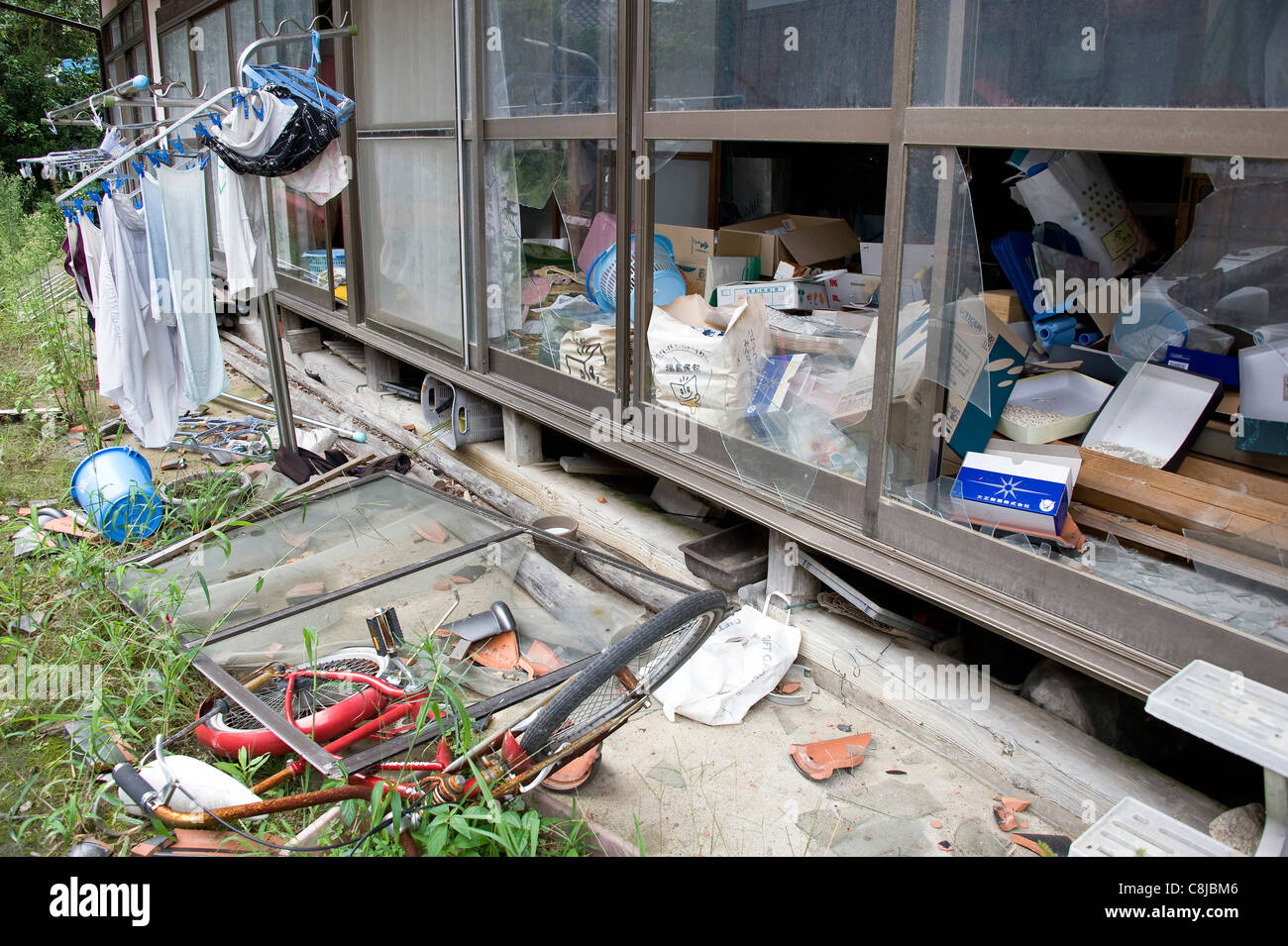A home remains untouched since the March 11 disasters forced residents out of Okuma in Fukushima Prefecture, Japan Stock Photo