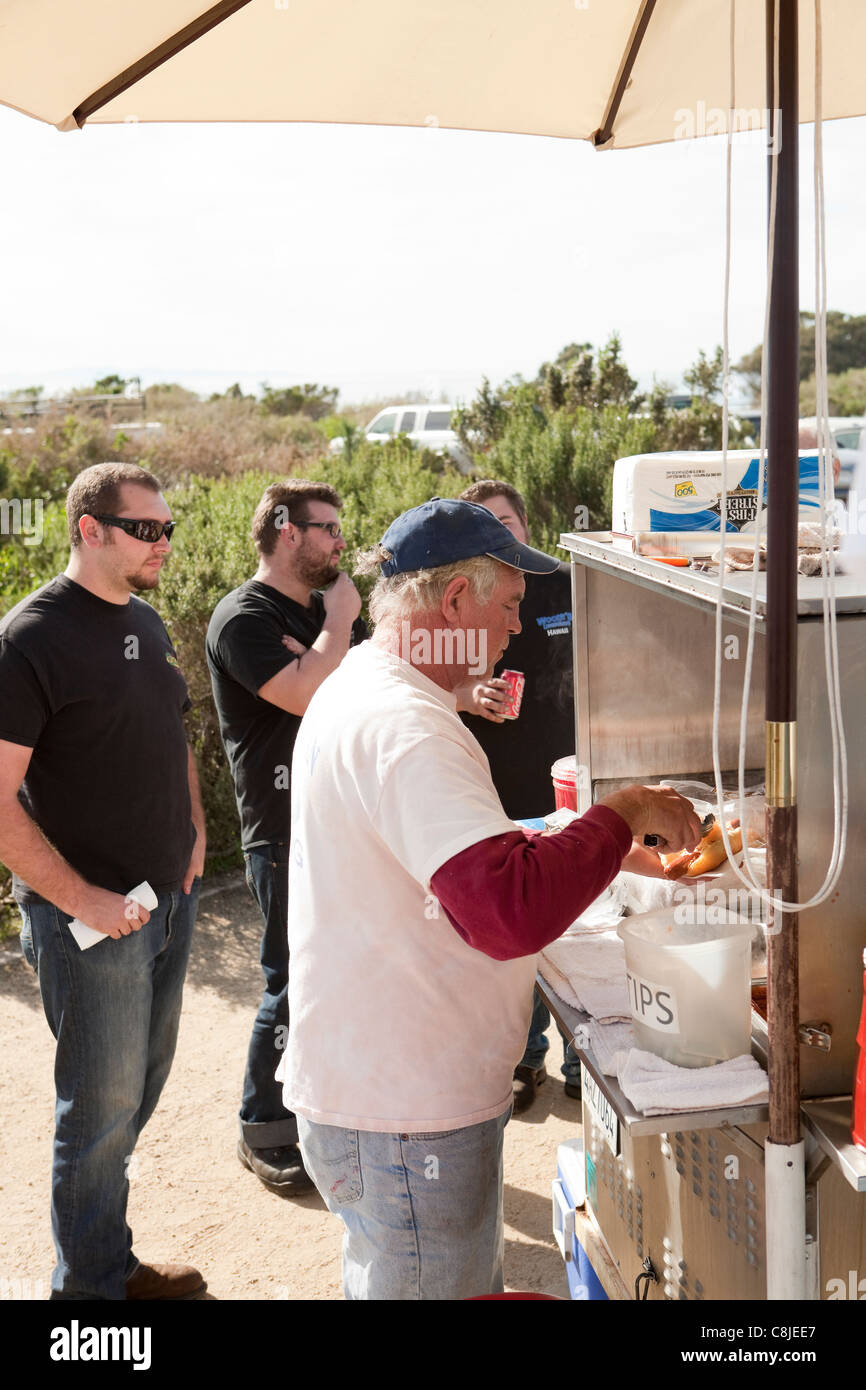 Bill Connell serves a variety of hot dogs at Surf Dog, Carpinteria, California, United States of America Stock Photo