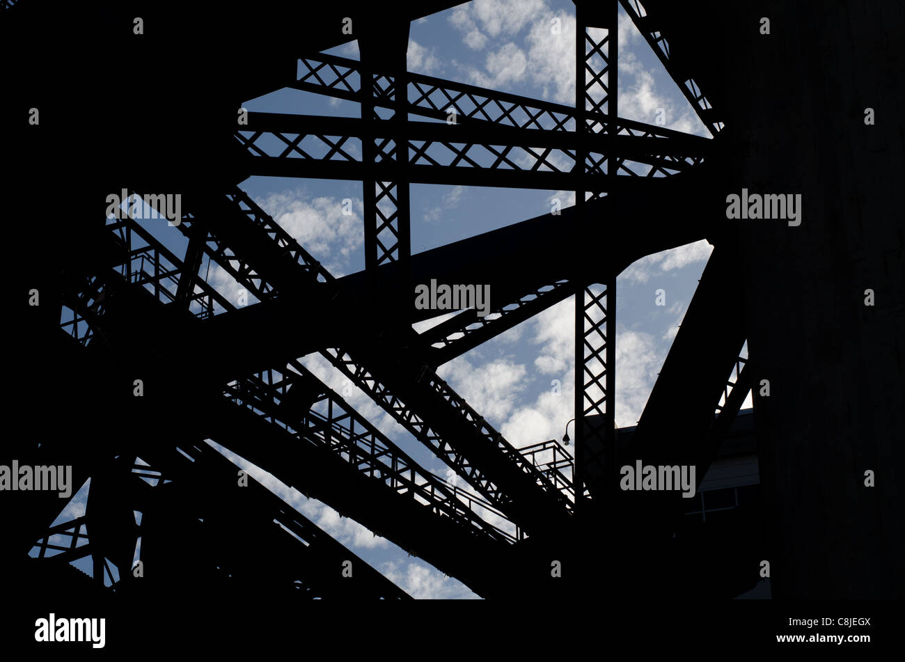 through Girders to blue sky, on architectural works on a traffic bridge in San Francisco, California Stock Photo