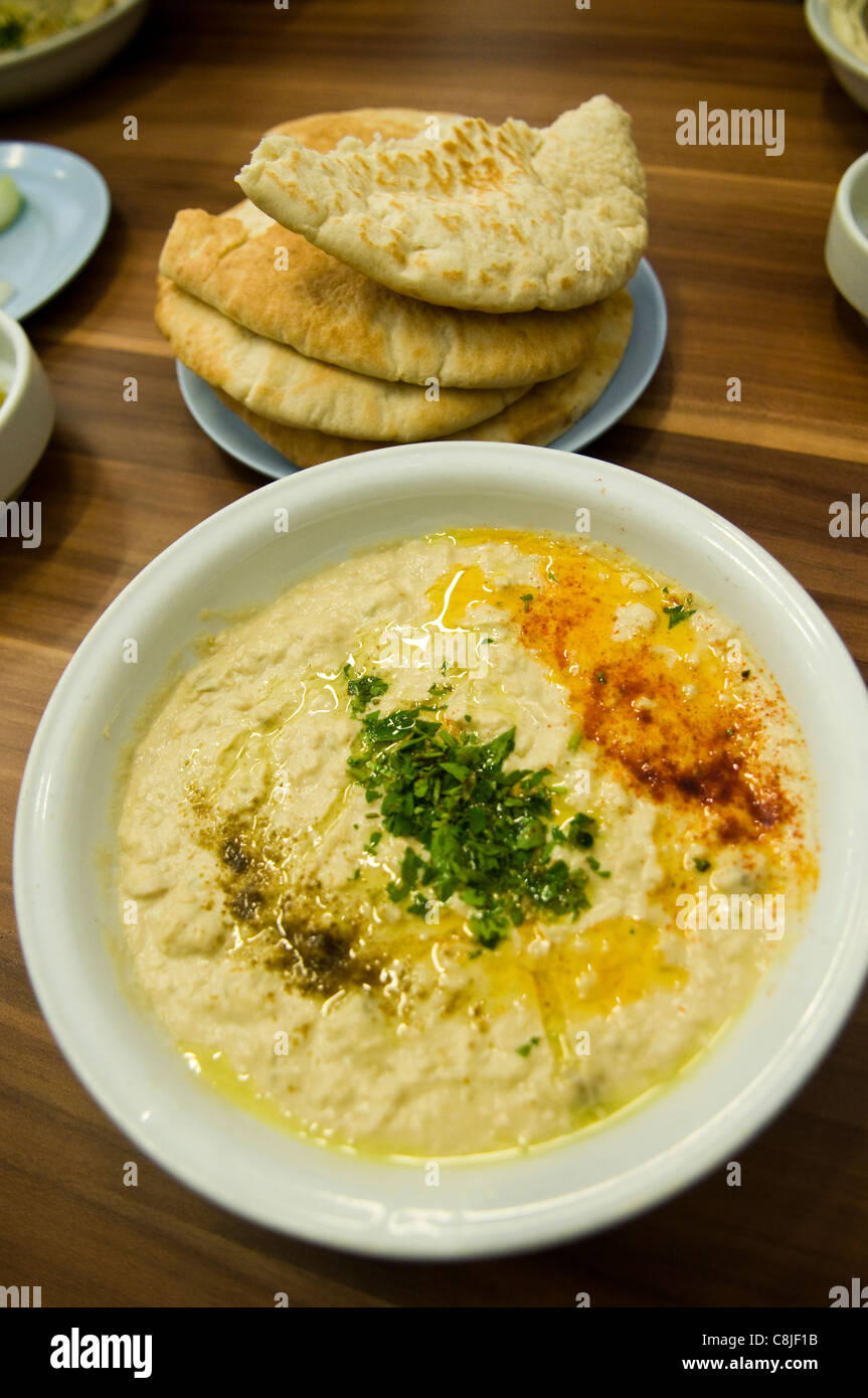 A bowl of Hummus and pita bread is probably the most popular staple