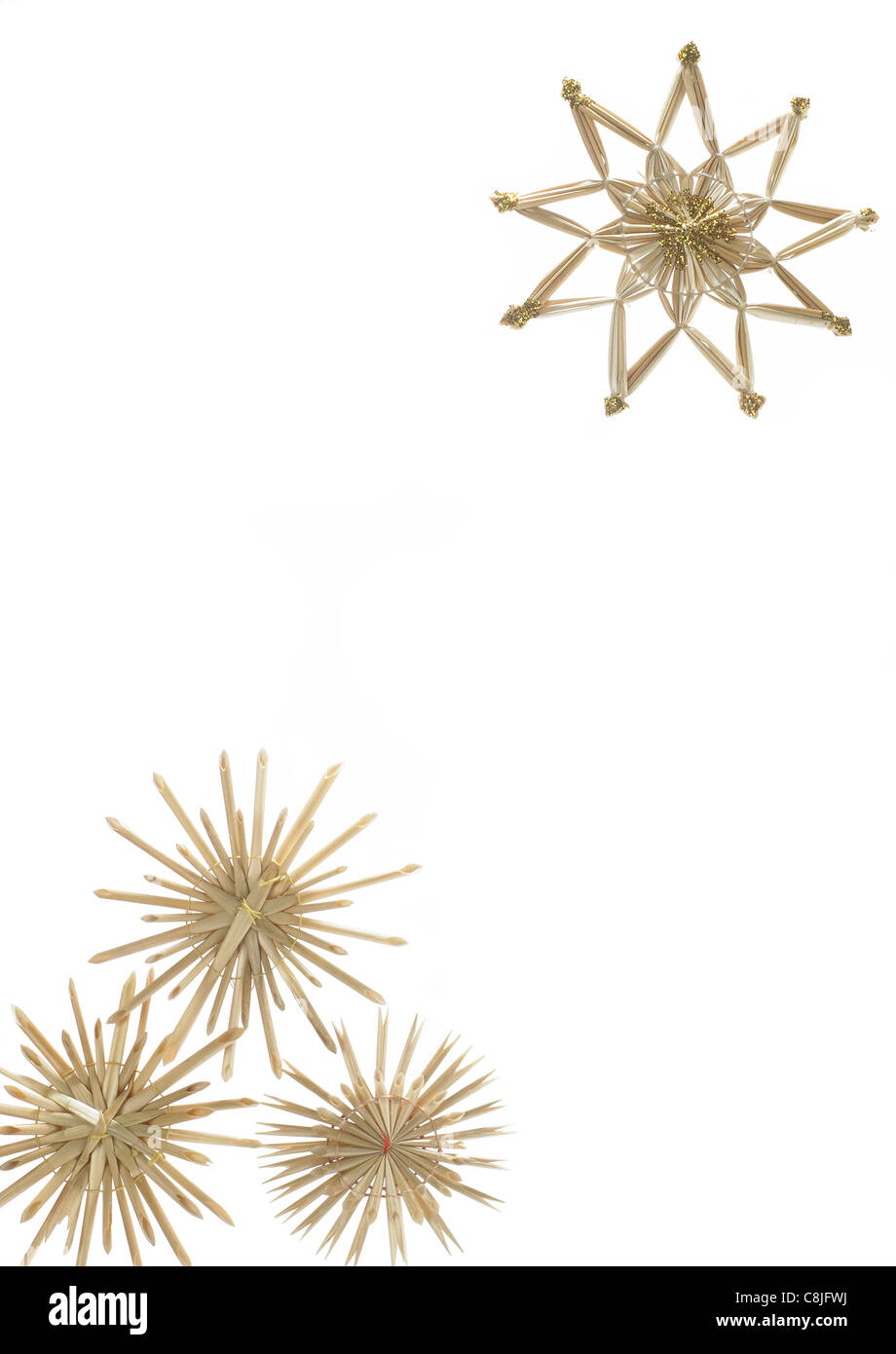 Studio photography of some straw stars isolated on white Stock Photo