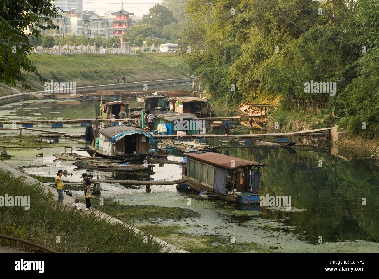 Living on a boat Chinese way, simplicity of living, boat people, people,  life, houseboat, houseboats Stock Photo