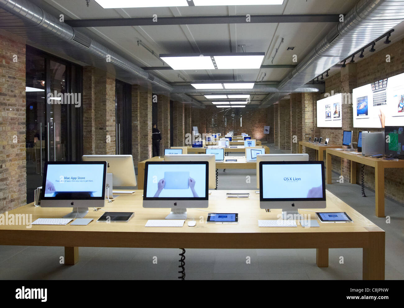 Staff at the apple store in covent garden hi-res stock photography and ...