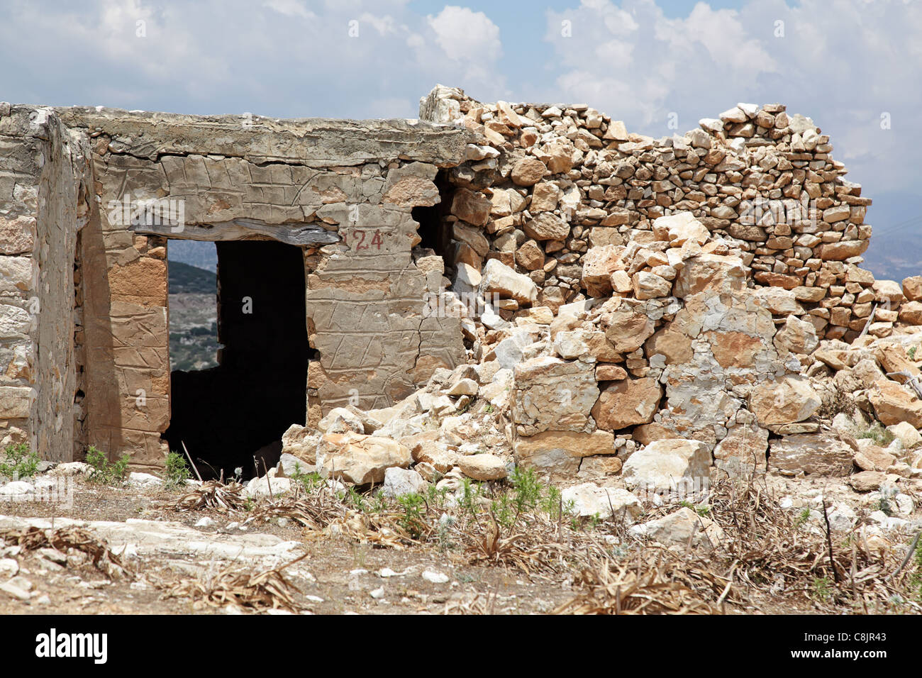 Old house ruin after earthquake. Crete, Greece. Stock Photo