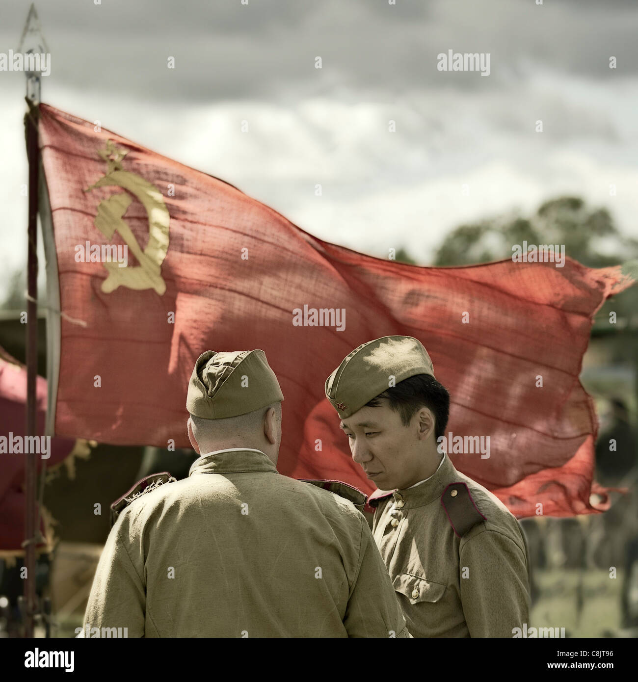 Hammer & Sickle Red Flag of Soviet Union USSR with Enlisted Ranks showing Shoulder Boards & Pitlokas WW2 Era Stock Photo