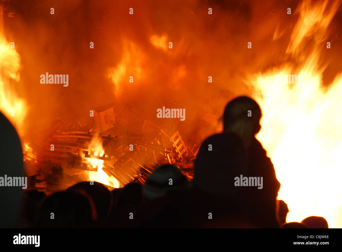 A man watching the bonfire in Wolverhampton in celebration of Guy