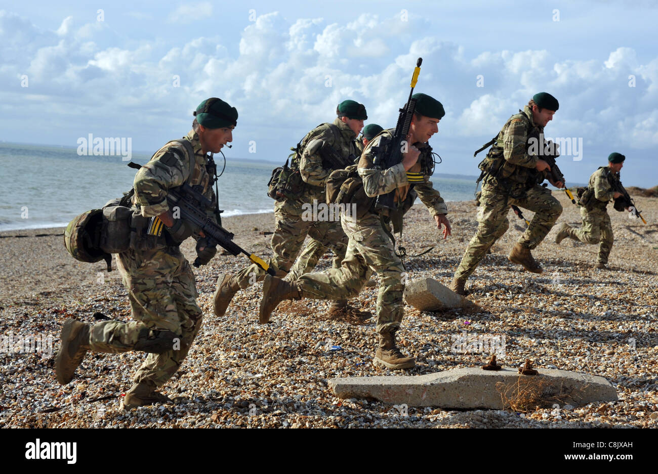 UK, Royal Navy and Royal Marines beach assault and anti-piracy training at Browndown, Hampshire with HMS Bulwark and HMS Sutherland.  PICTURE BY: DORSET MEDIA SERVICE Stock Photo