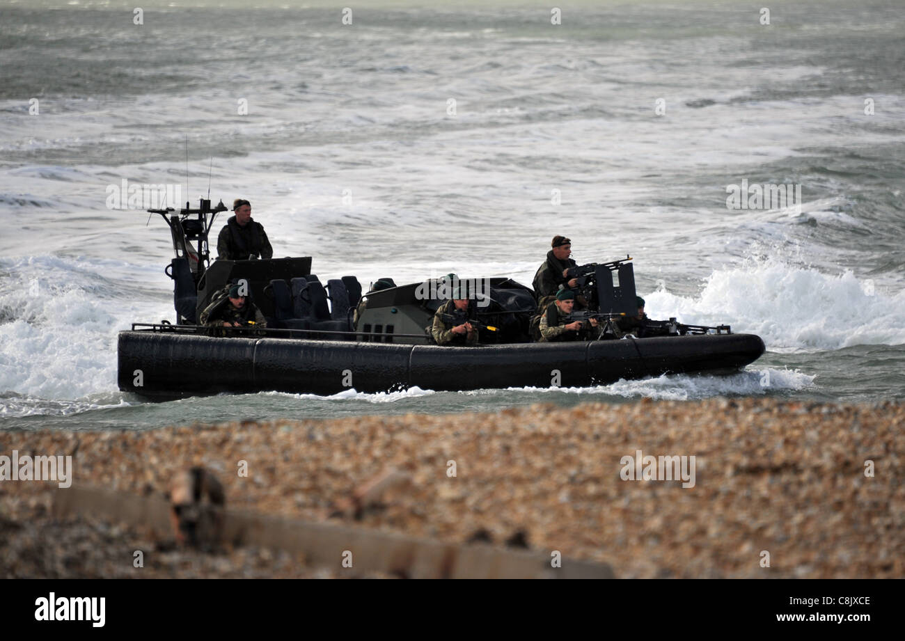 UK, Royal Navy and Royal Marines beach assault at Browndown, Hampshire. Beach recce troop. Stock Photo
