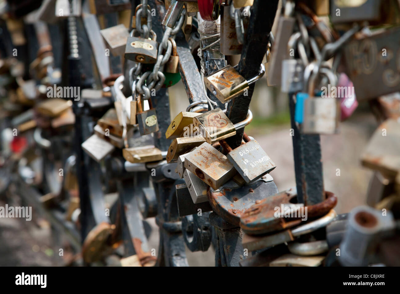 Wedding padlocks on a bridge in Vilnius, Lithuania Stock Photo