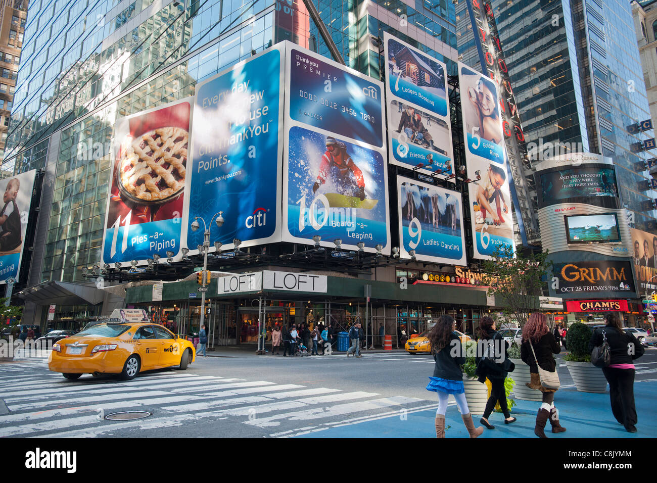 An advertisement for Citibank in Times Square in New York exuberantly promotes consumerism for the Christmas holiday Stock Photo