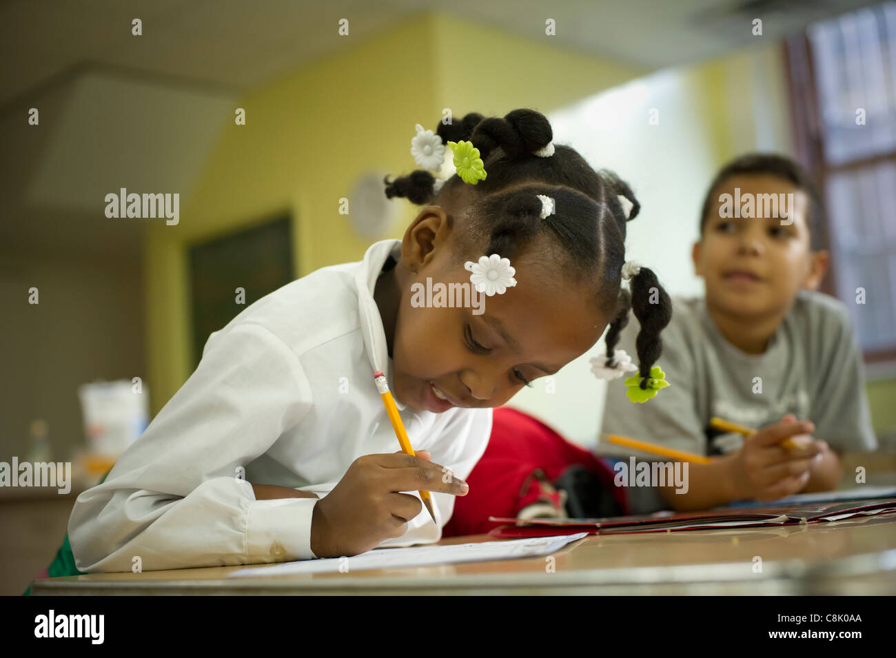 second-and-third-graders-do-homework-during-an-after-school-program-in