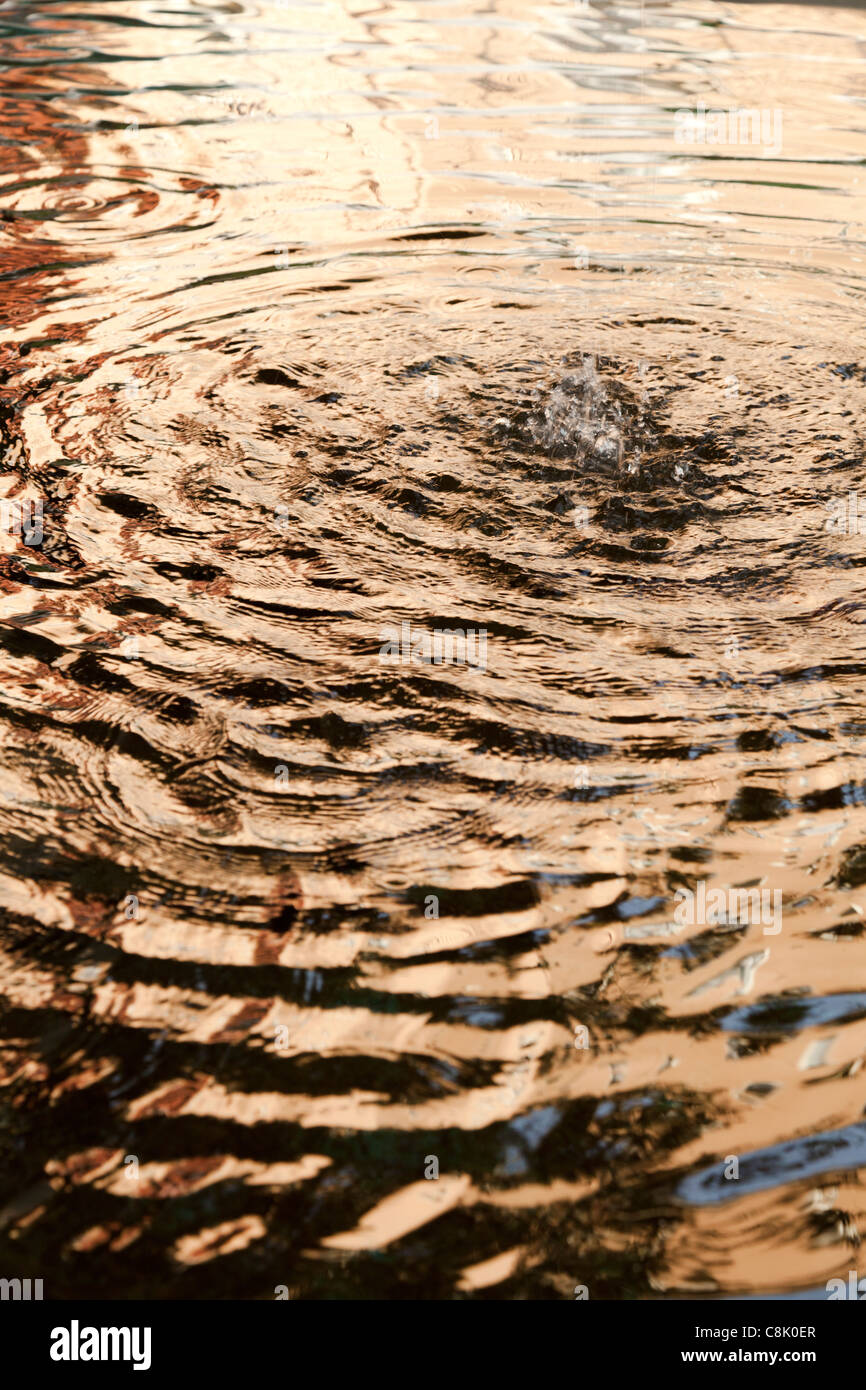 ripple reflection in fountain water Stock Photo